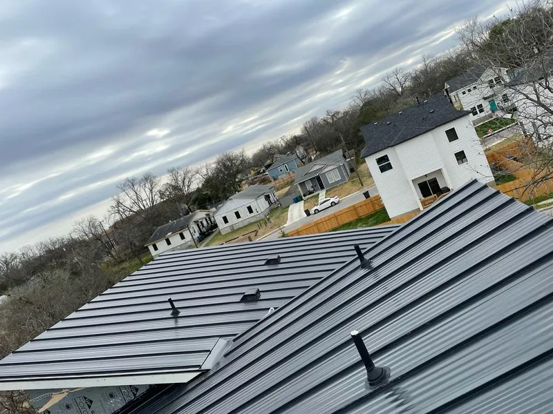 Standing seam metal roof panels with vents for Skylight Repair in Ithaca